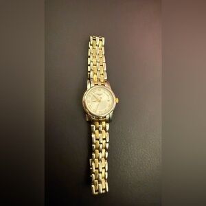 Tissot Gold and Silver Watch